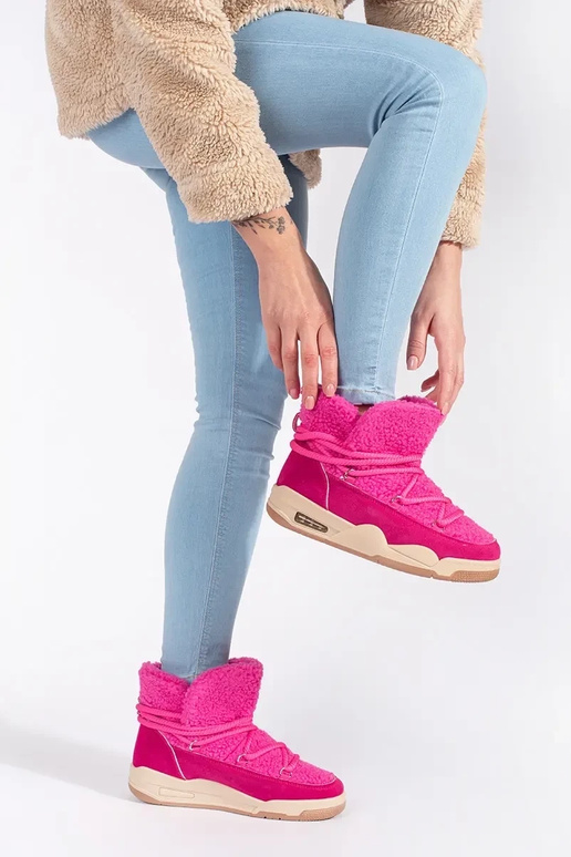 roze SnoInboots voor dames op een...
