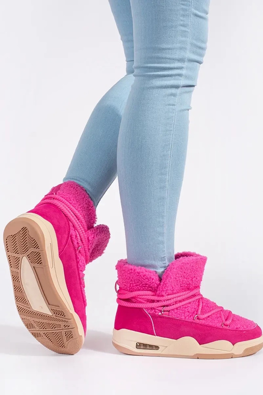 roze SnoInboots voor dames op een...