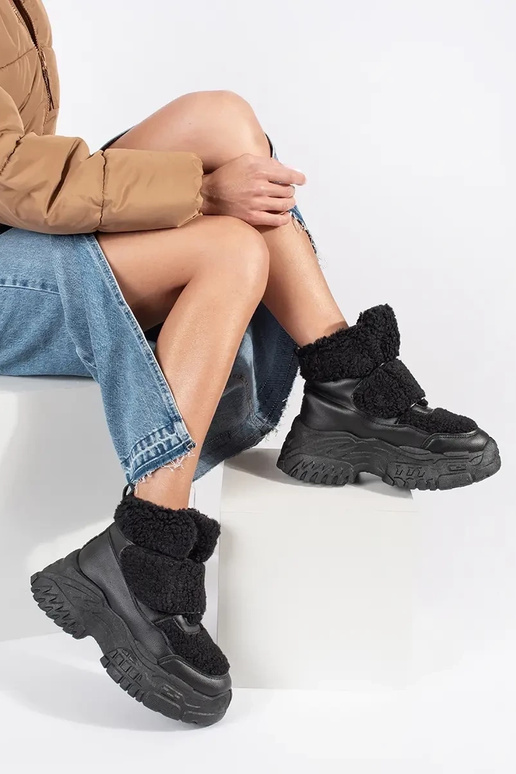 Bottes de neige noires à plateforme...