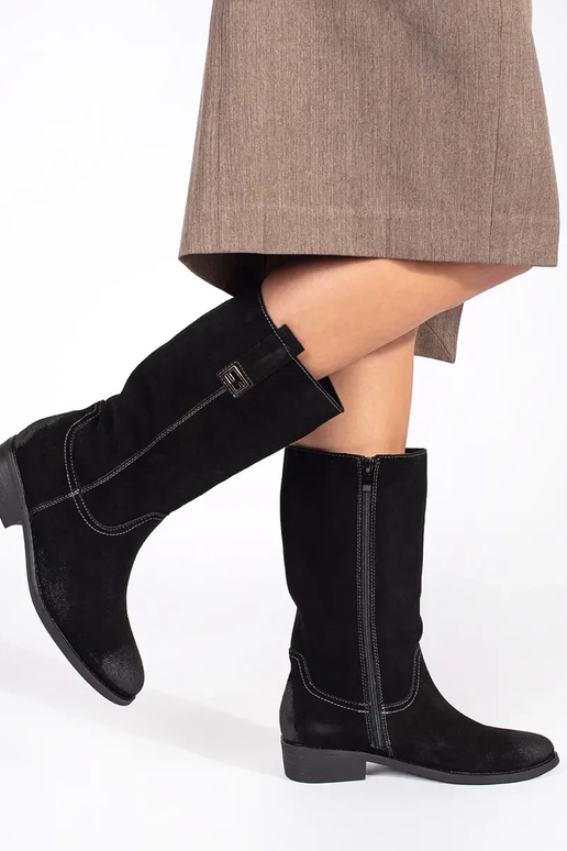 Bottes longues en cuir de cow-boy... Bottes longues en cuir de cow-boy...