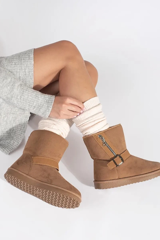 Zandkleurige dames snowboots met...