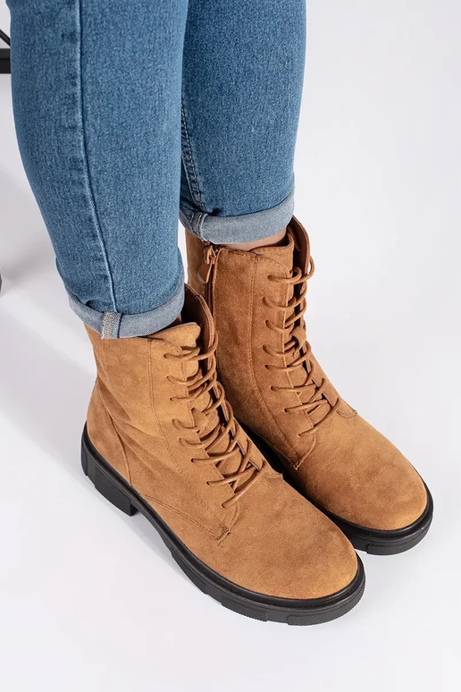 Bruine geïsoleerde enkellaarsjes Bruine geïsoleerde enkellaarsjes