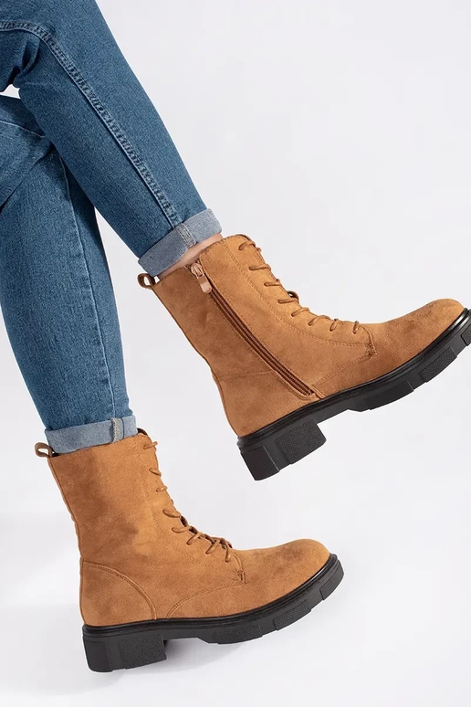 Bruine geïsoleerde enkellaarsjes Bruine geïsoleerde enkellaarsjes