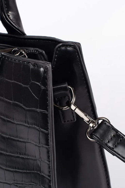 Sac à main noir de taille moyenne à...