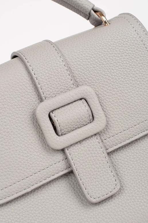 Graue kleine Tasche mit goldenen...