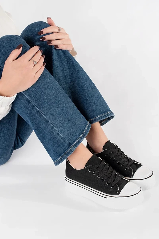 Schwarze klassische Damen-Sneaker auf...