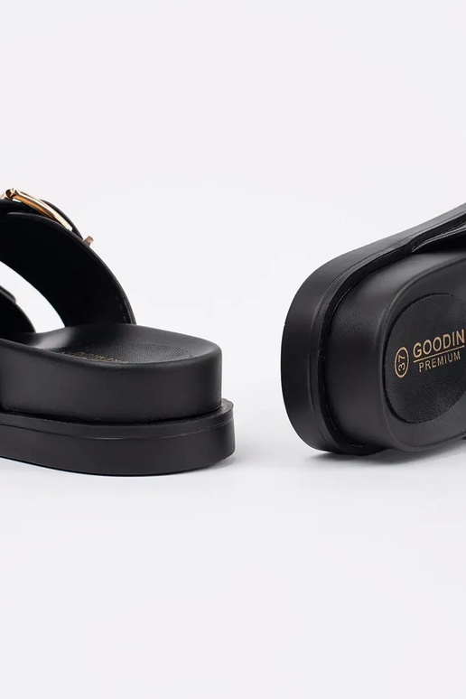 Zwarte platte slippers met gespen