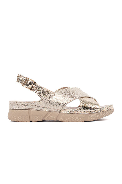 Gouden platte dames sandalen Gouden platte dames sandalen