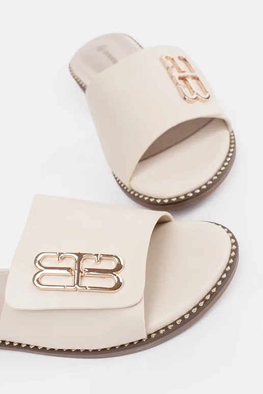 elfenbeinfarbene Damenflipflops mit... elfenbeinfarbene Damenflipflops mit...