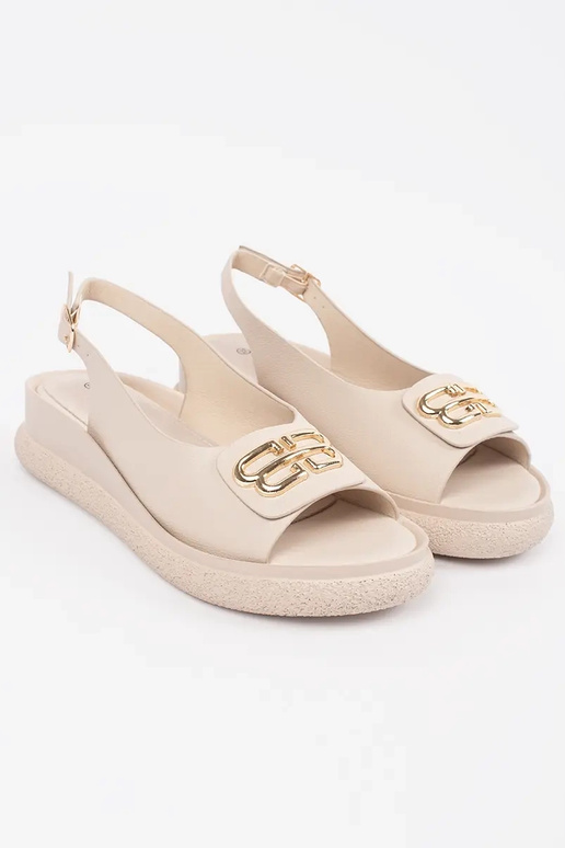 Flache Sandalen in beige mit Dekoration
