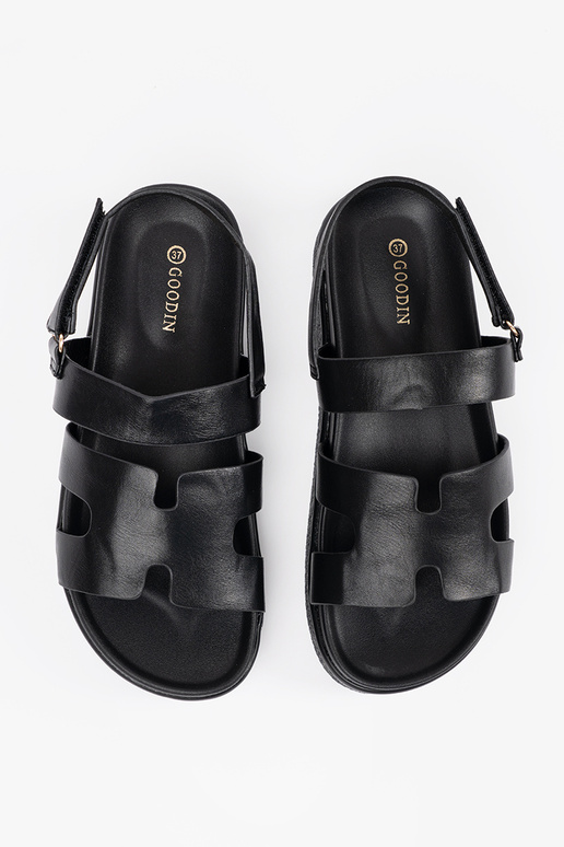 Schwarze Plattformsandalen