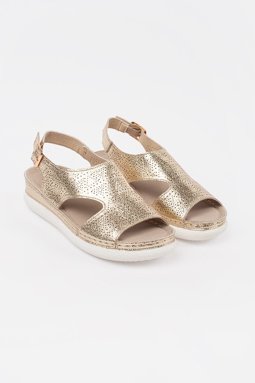 Goldene Sandalen auf hellem Absatz Goldene Sandalen auf hellem Absatz