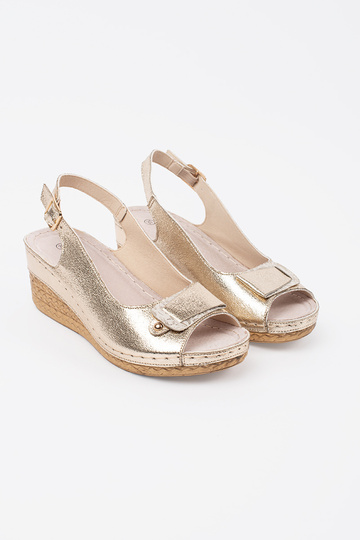 Gouden sandalen op een lage... 2