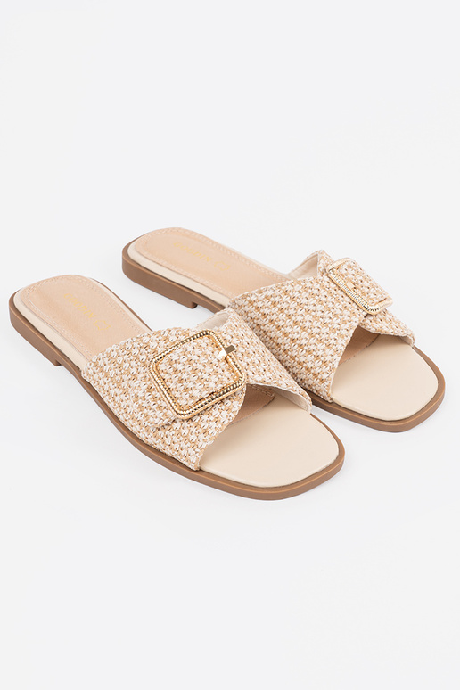 Chaussons couleur sable avec des boucles