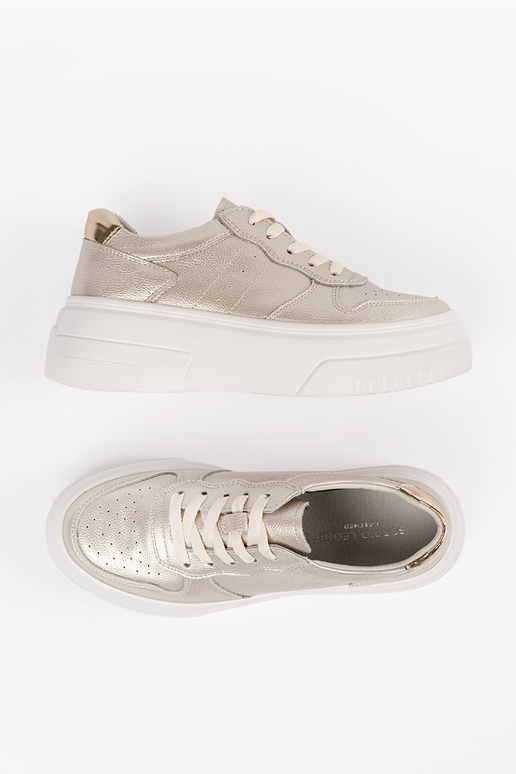 Gouden leren dames sneakers met... Gouden leren dames sneakers met...