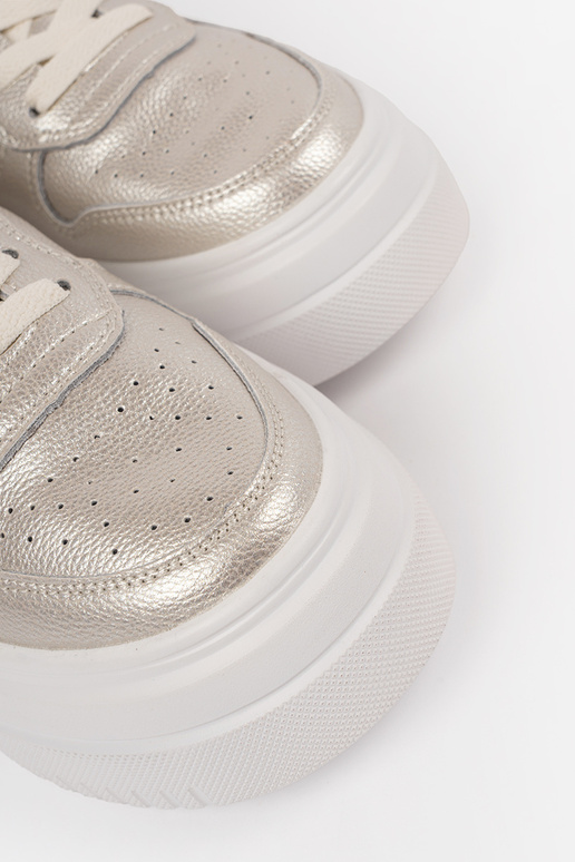 Baskets en cuir couleur or pour... Baskets en cuir couleur or pour...