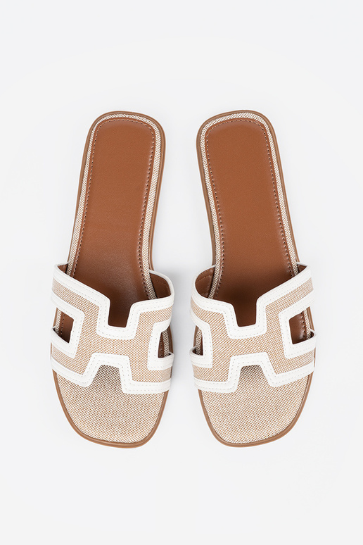 Initte kleur slippers dames op een...