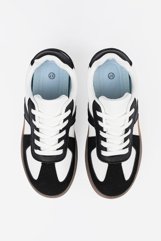 Schwarz-weiße Sportschuhe im...