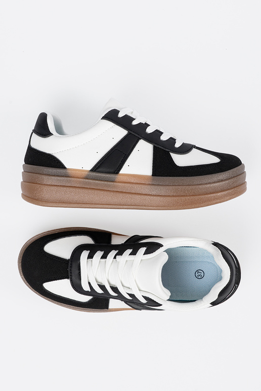 Baskets noires et blanches de style...