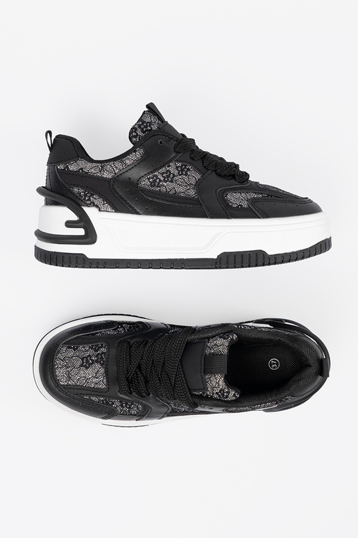 Schwarz-weiße Freizeit-Schuhe für... Schwarz-weiße Freizeit-Schuhe für...