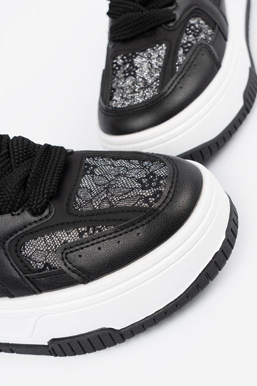 Schwarz-weiße Freizeit-Schuhe für... Schwarz-weiße Freizeit-Schuhe für...