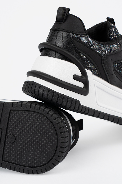 Schwarz-weiße Freizeit-Schuhe für... Schwarz-weiße Freizeit-Schuhe für...