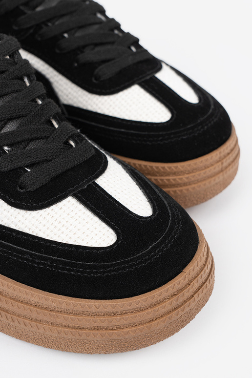 Zwarte dames sneakers met witte details Zwarte dames sneakers met witte details