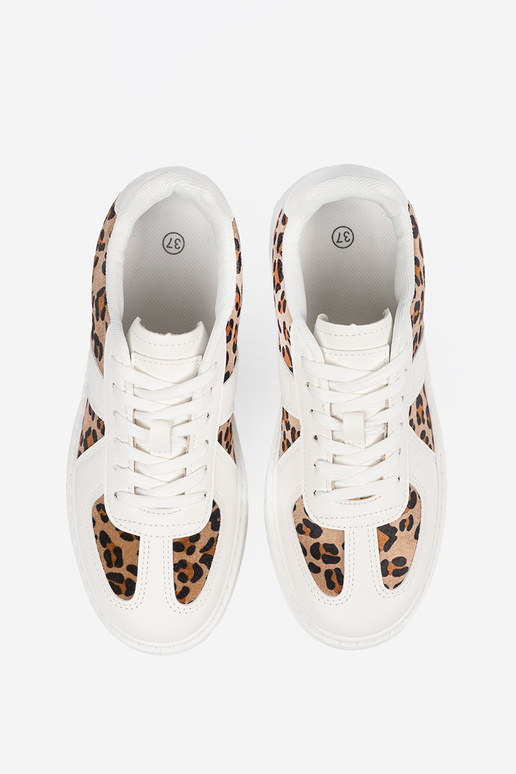 Witte sportschoenen met... Witte sportschoenen met...