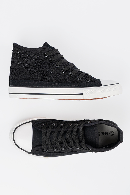 Schwarze hohe Schuhe mit...