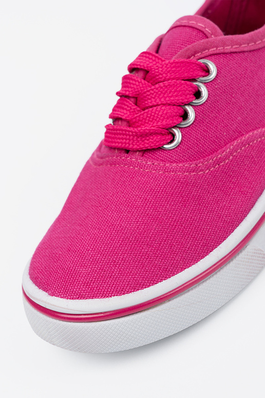 Roze kinderschoenen met een witte zool Roze kinderschoenen met een witte zool