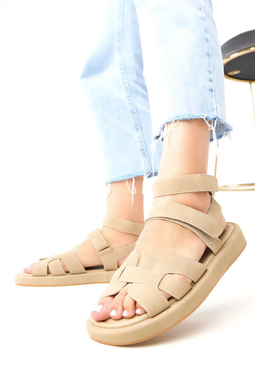 Donker zandkleurige sandalen met sluiting bij de enkel Maimuna