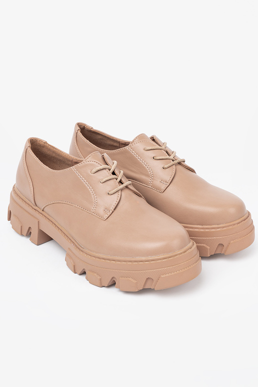beige gebonden schoenen met platform