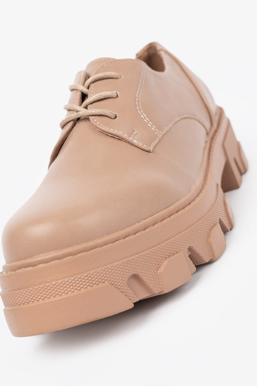 beige gebonden schoenen met platform