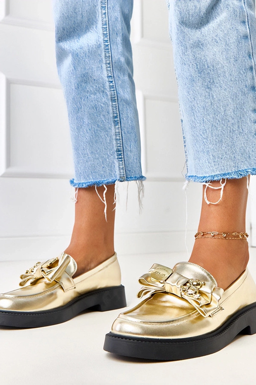 Gouden mocassins met strik en...