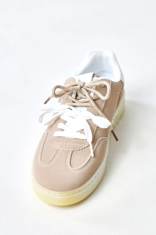 Bruine sneakers met plateau en witte... Bruine sneakers met plateau en witte...