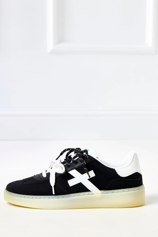 Zwarte sneakers op platform met witte... Zwarte sneakers op platform met witte...