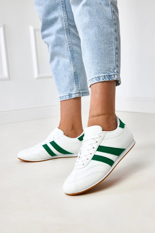 Witte tennisachtige sneakers met... Witte tennisachtige sneakers met...