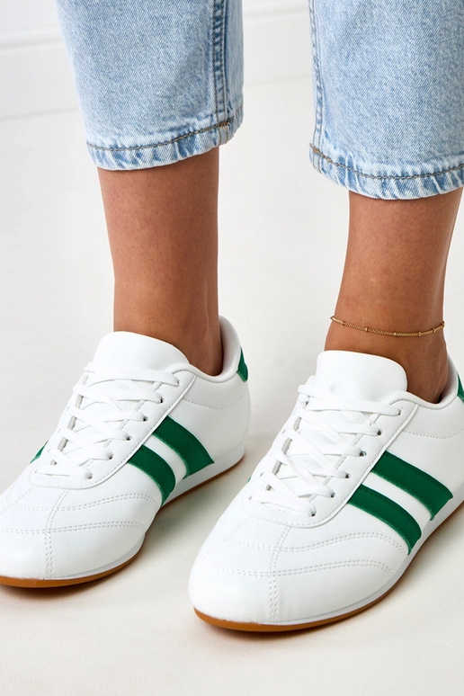Witte tennisachtige sneakers met... Witte tennisachtige sneakers met...