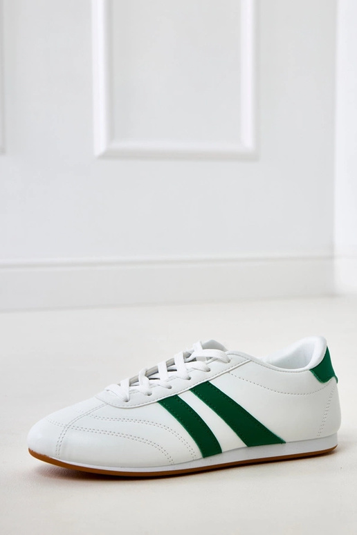 Witte tennisachtige sneakers met... Witte tennisachtige sneakers met...