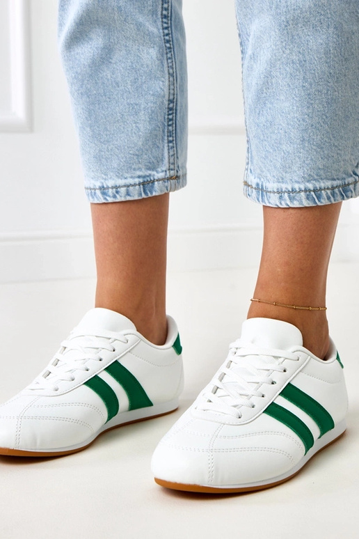 Witte tennisachtige sneakers met... Witte tennisachtige sneakers met...