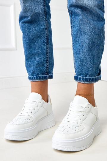 Witte sportschoenen met...