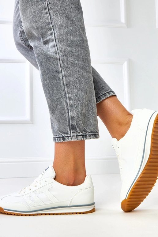 Baskets sport blanches avec éléments... Baskets sport blanches avec éléments...