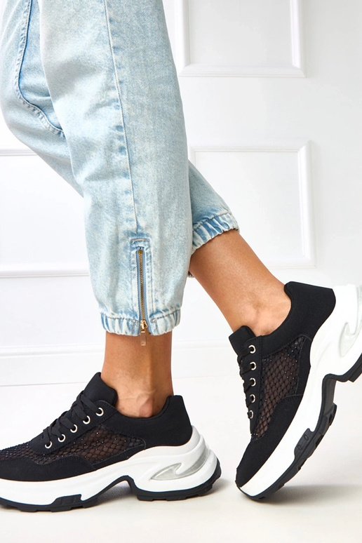 Schwarze Sneakers auf Plattform mit... Schwarze Sneakers auf Plattform mit...