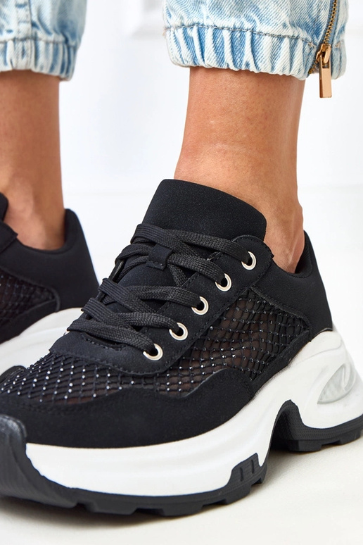 Schwarze Sneakers auf Plattform mit... Schwarze Sneakers auf Plattform mit...