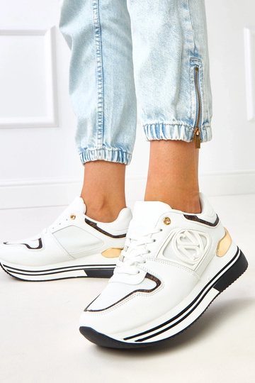 Wit-zwart sneakers op een... 2