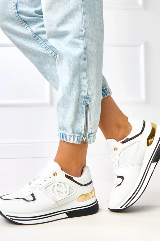 Baskets bicolores blanches et noires... Baskets bicolores blanches et noires...