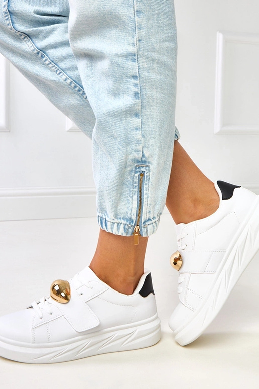 Baskets blanches sur plateforme avec... Baskets blanches sur plateforme avec...