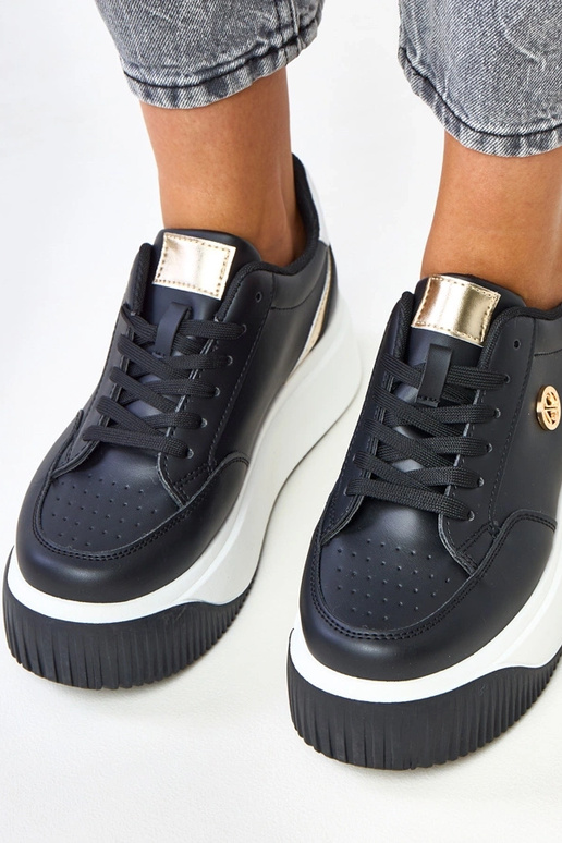 Baskets noires à plateforme avec... Baskets noires à plateforme avec...