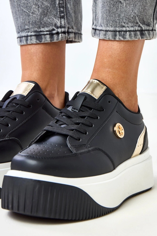 Baskets noires à plateforme avec... Baskets noires à plateforme avec...