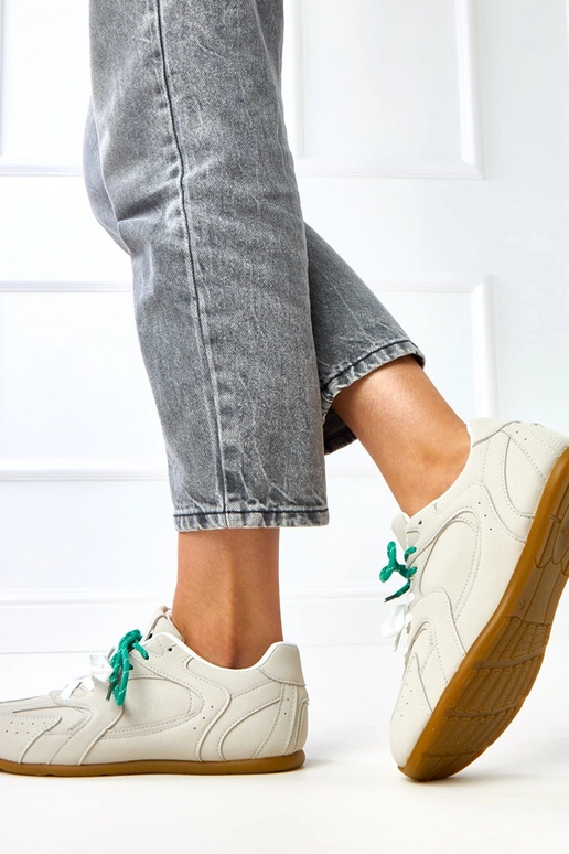 Graue Sportschuhe mit doppelten...